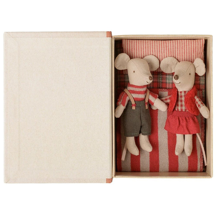 Maileg Christmas Twin Mice tucked into their striped bed inside the open storybook box