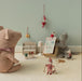 Maileg twin mice reading a Christmas Tales book in a festive playroom scene