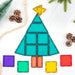 Christmas tree built from Connetix magnetic tiles with a yellow star and square presents