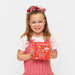 Girl holding the Connetix Christmas Reindeer Pack box